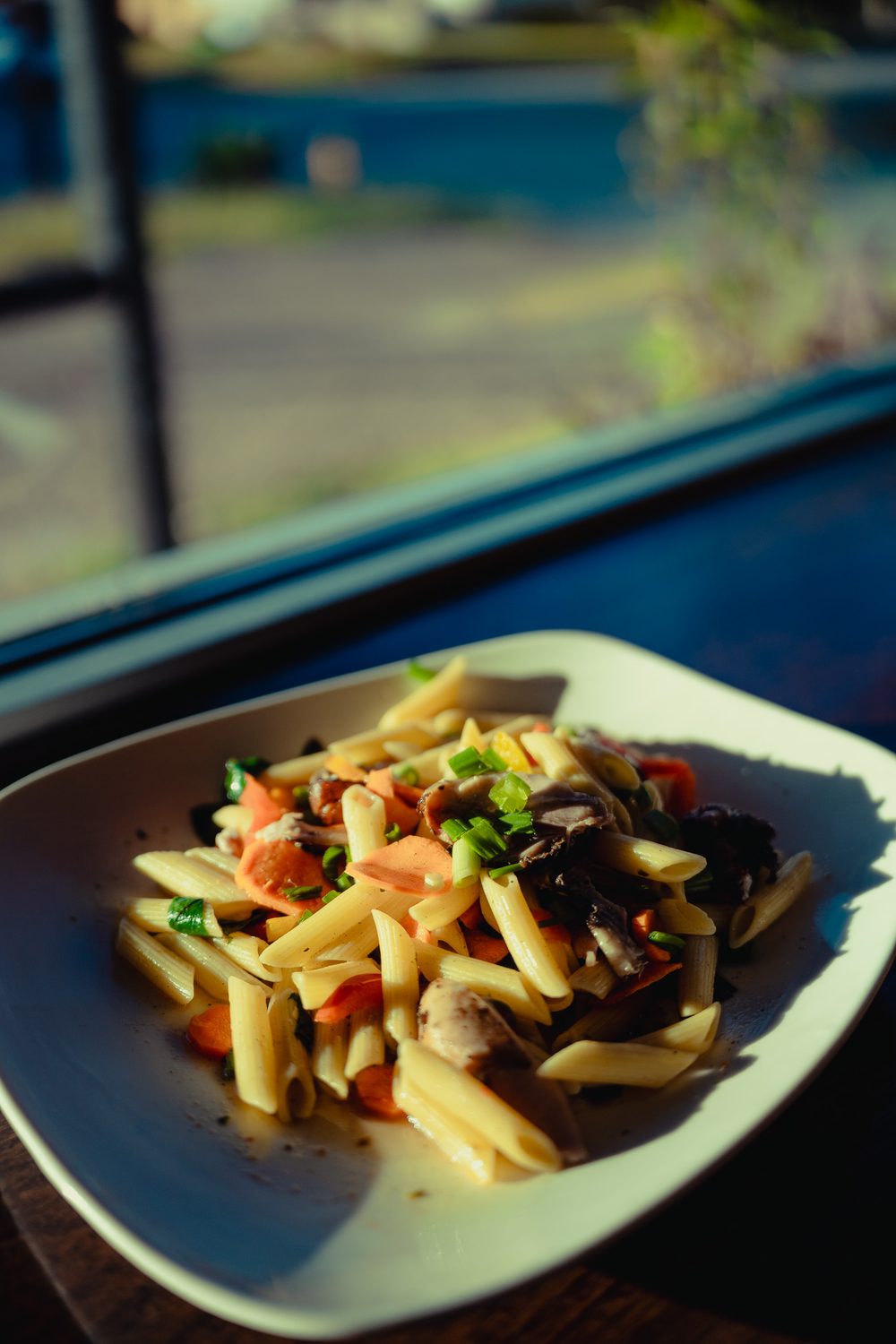 Rasta pasta with shrimp, chicken, spinach, and peppers